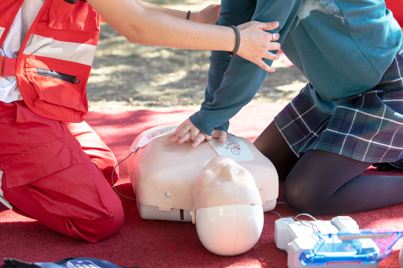 Train staff and students to use defibrillators in schools
