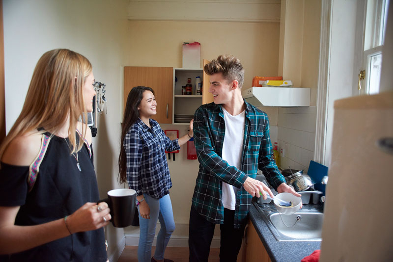 A group of students in a kitchen