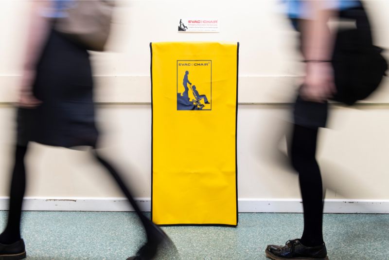 An evacuation chair in a corridor