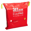 Packed emergency evacuation sledge in red bag viewed from a front angled perspective