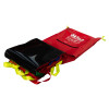 Partially unpacked emergency evacuation sledge showing red material with yellow straps and black section at an angled view