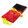 Emergency evacuation sledge unfolded and half rolled with bright yellow straps and red cover showing white text and face outline