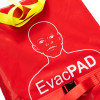 Part of an emergency evacuation sledge showing a red fabric with a white line drawing of a head and the word EvacPAD printed on it