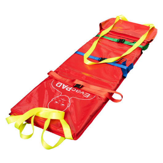 Emergency evacuation sledge unpacked and laid flat with coloured straps and handles visible