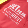 Close up of the emergency evacuation sheet logo printed on red fabric with weight limit and certification details
