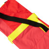 Close up of the strap on the emergency evacuation sheet showing red and yellow fabric and black fastening