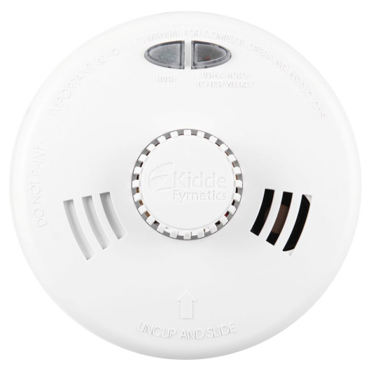 White Kidde Fyrnetics smoke alarm with vented sides, HUSH and TEST WEEKLY buttons, and embossed operating instructions.