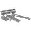 assa abloy dc140a door closer showing all parts including the main closer body cover arm bracket and small fitting piece