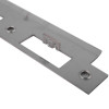Close up of the sashlock keep from an assa abloy sashlock fire door kit showing metal plate and latch catch