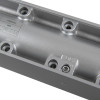 Close-up of the adjuster on a union ce26v overhead door closer power size en 2 6 showing metal components and screws