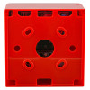 Back view of a manual call point showing its red plastic casing and mounting holes