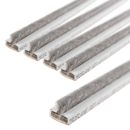 Pack of white single door fire and smoke seal strips with grey felt edges shown on a white background