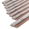 Close-up of brown double fire and smoke seal strips arranged in a pack