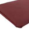 Close up of the corner of the astro pillow small showing textured deep red fabric and stitching details