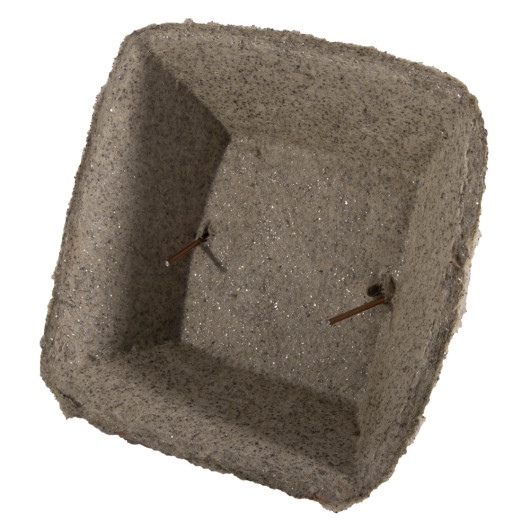 Angled view of a single box cover showing textured grey material and two metal pins inside
