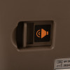 Detail of the brayden im13 red cpr manikin showing an orange volume icon on a brown surface with red illumination
