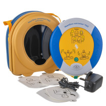 heartsine 360p trainer unit with case, electrode pads and power adapter shown as contents of the pack