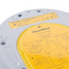 Closeup of the back of the heartsine 500p trainer unit showing a yellow label with instructions and safety information