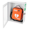 A white wall‑mounted cabinet with a transparent door containing an orange IPAD AED case marked with a heart and lightning bolt symbol. A green AED sign is fixed to the cabinet.