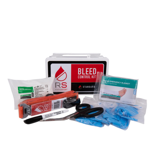 Contents of the rapidstop bleed kit standard showing a case, scissors, marker, gloves, emergency blanket and other first aid items