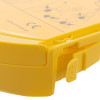 Close-up detail of the yellow heartsine trainer pak rewind mechanism showing the latch and hinge area