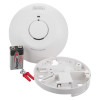 black and decker mains powered smoke alarm showing the main unit, battery, mounting plate and mounting screws