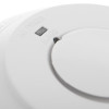 Close-up of the indicator light and test button on the black and decker mains powered smoke alarm