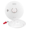 Contents of black and decker kitchen 10yr battery wireless heat alarm including alarm unit, mounting plate, screw, and wall plug