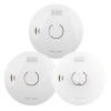 Three white BLACK+DECKER alarms, two labelled as smoke alarms and one as a heat alarm, each with a central sensor and minimalist circular design.