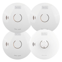 Four circular BLACK+DECKER alarms, three smoke alarms and one heat alarm, each featuring a central test button and sensor with simple white casing.