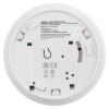 Back view of black and decker connected smoke alarm showing battery compartment and labels