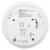Back view of a black and decker smoke alarm showing battery compartment and label with model and safety marks