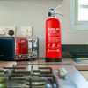 Britannia P50 2ltr Water Mist Fire Extinguisher Next to Toaster and Cooker in a Kitchen