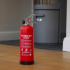 p50 2ltr water mist extinguisher standing on hard floor angled with a stove in the background