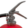 Close up of the handle of a p50 service free 6kg powder extinguisher showing the metal lever and pressure gauge