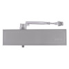 briton 1120b overhead door closer in silver shown from the front with arm extended