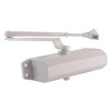 Front view of a white briton 121ce overhead door closer showing the main body and attached arm mechanism