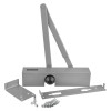 briton 2003v overhead door closer en1 4 with metal parts and screws laid out on a white background