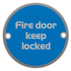 Blue fire door keep locked metal sign with white text and two mounting holes shown from the front