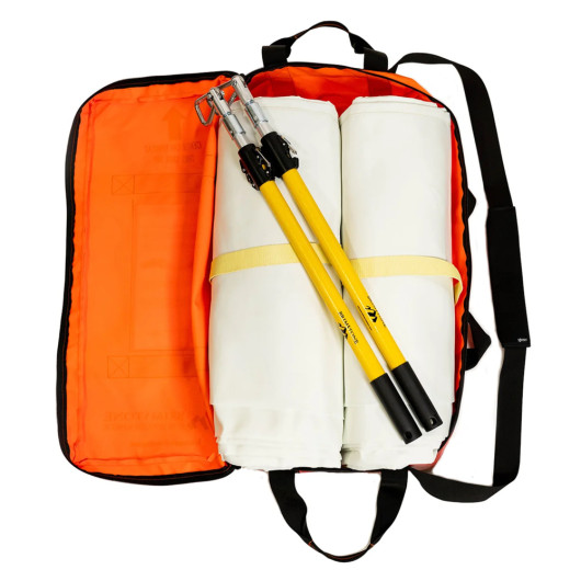 brimstone ev blanket bag open with two rolled white blankets and yellow poles inside on an orange background