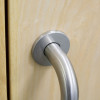 Close-up of the briton 4700 pull handle rose attached on a wooden door