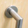 briton 4700 pull mitred handle shown attached on a light wooden door