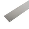 Closeup of a metal briton 4700 push plate 675 showing smooth surface and corner screw holes