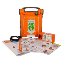 A bright orange defibrillator with all its contents