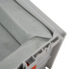 Close-up of the lining inside the battery fire protection box showing the fabric and corner details