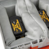 battery fire protection box showing cushioned soft grey pillows holding two black and yellow batteries inside the box