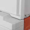 Closeup of the corner and edges of the celisafe2l stacked showing white and orange parts in detail