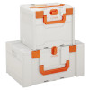 Stacked Celisafe3Xl Cemo Li Safe 3 Xl boxes in white with orange handles and latches visible from the front and side