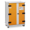 A metal cabinet with an orange front panel, grey frame, black hinges, central lock, and safety labels indicating hazardous‑material storage.