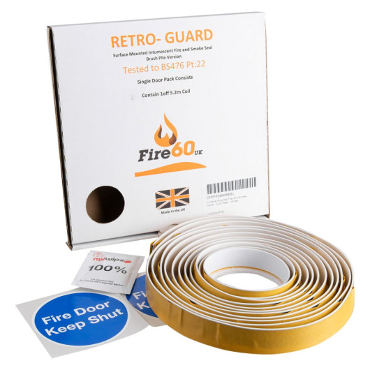Box packaging and a coil of Cfpfpsmwreel Fire Door Seal Roll White with cleaning wipe and fire door stickers visible